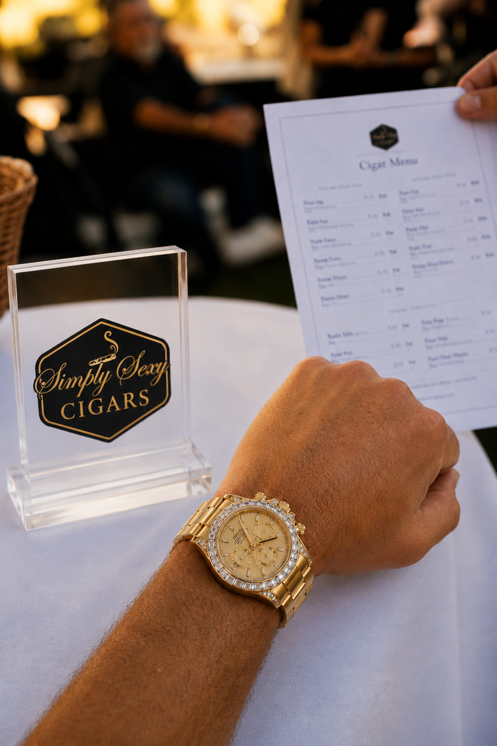 A guest reviews the Simply Sexy Cigars menu at a branded table during a corporate appreciation event