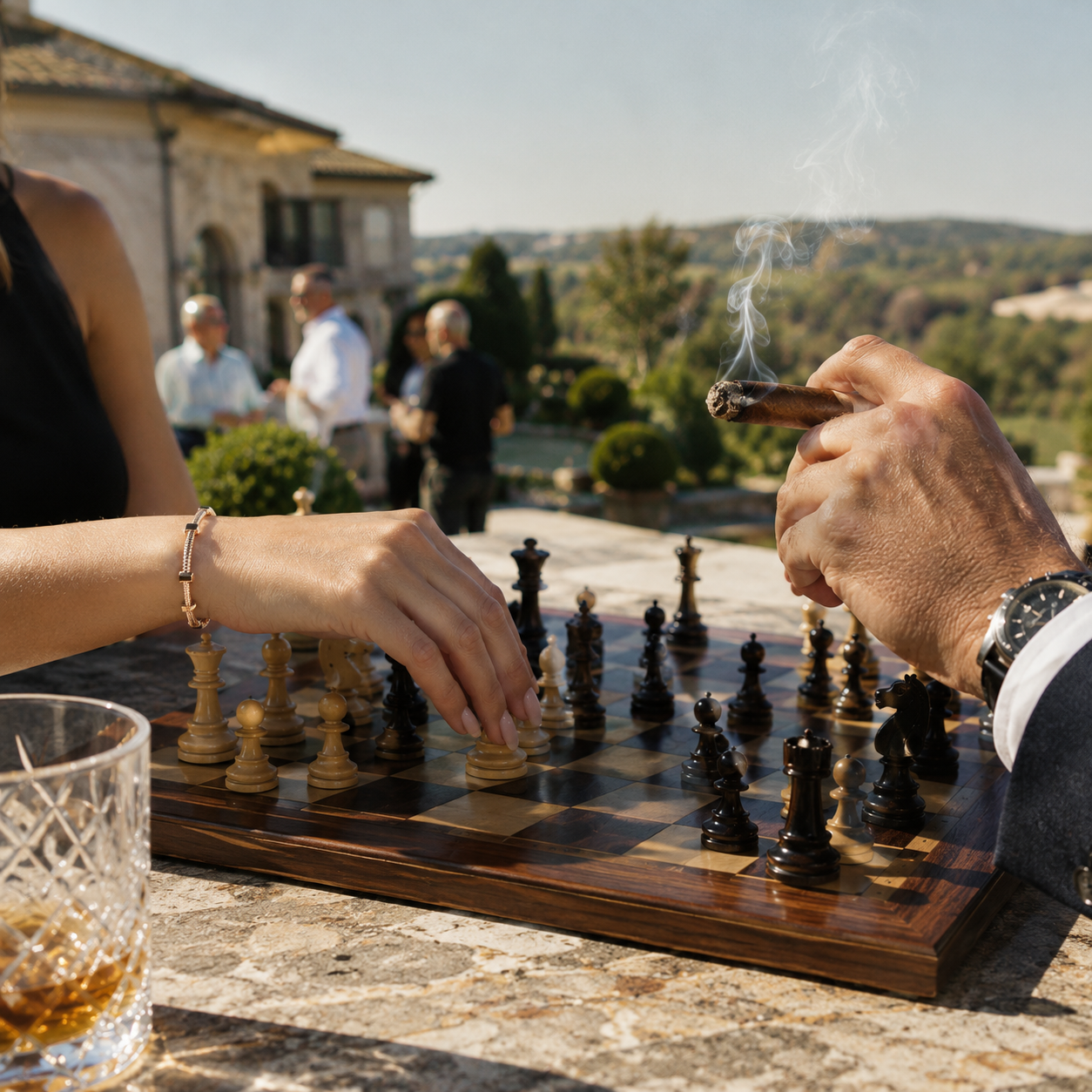 Two guests share a game of chess and a cigar on a private estate terrace overlooking Northern California wine country